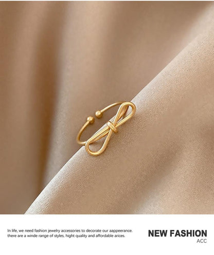 Minimalist Open Adjustable Ring with Twisted Bow Tie Gold